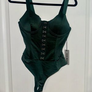 Haute Monde green front clip bodysuit medium BNWT